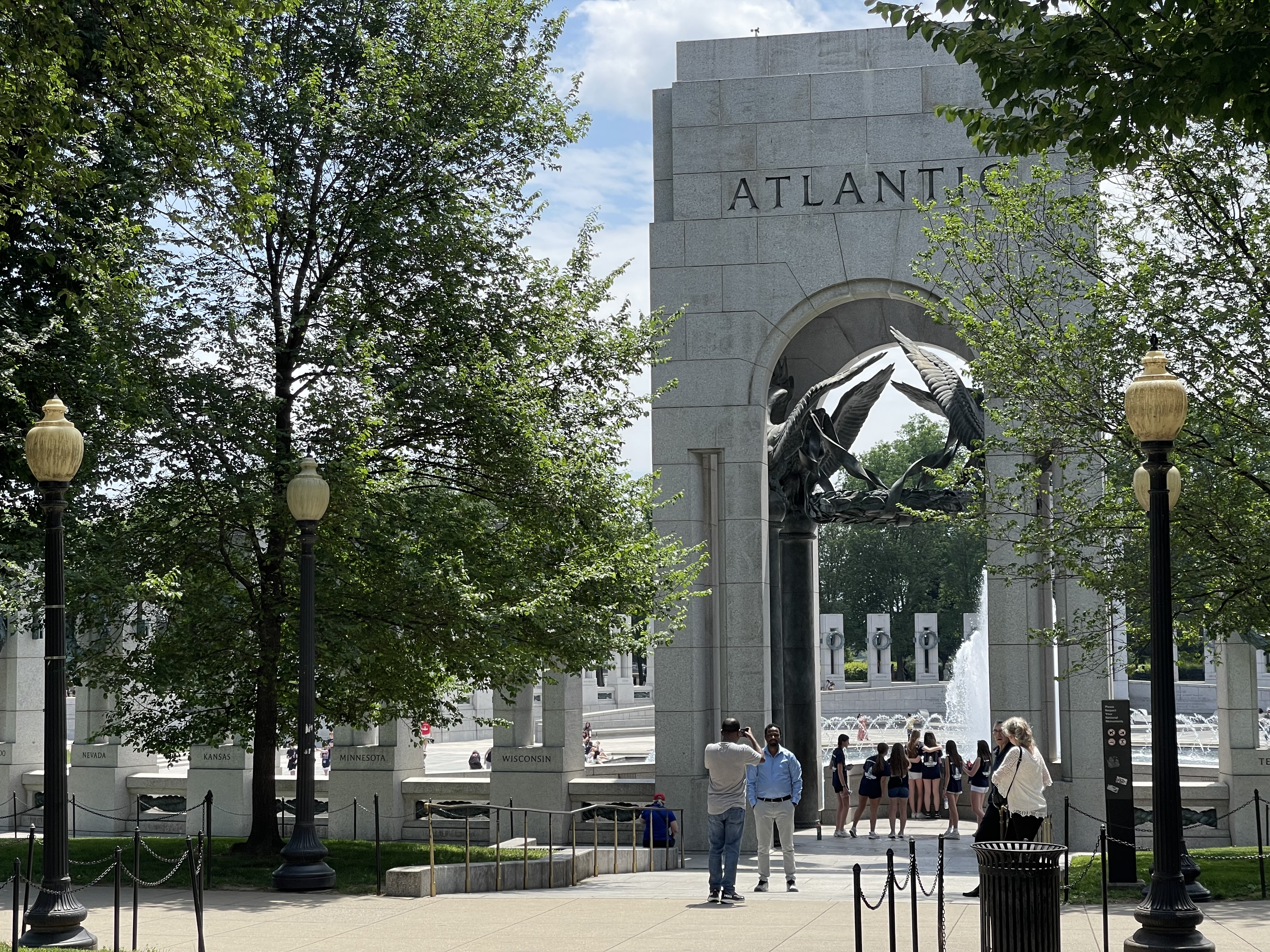 WWII Memorial People taking photos in front of the WWII memorial in Washington, DC.