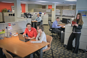 people working and collaborating in various types of work areas